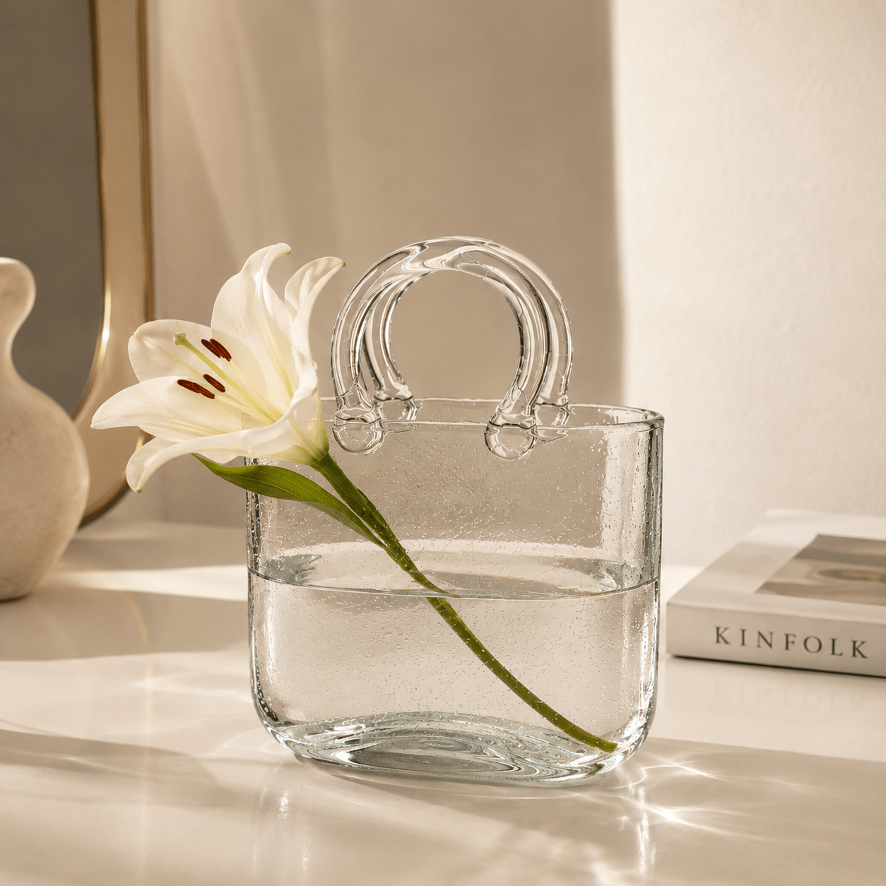 Homero Transparent Hand Blown Glass Vase with Elegant Purse Design