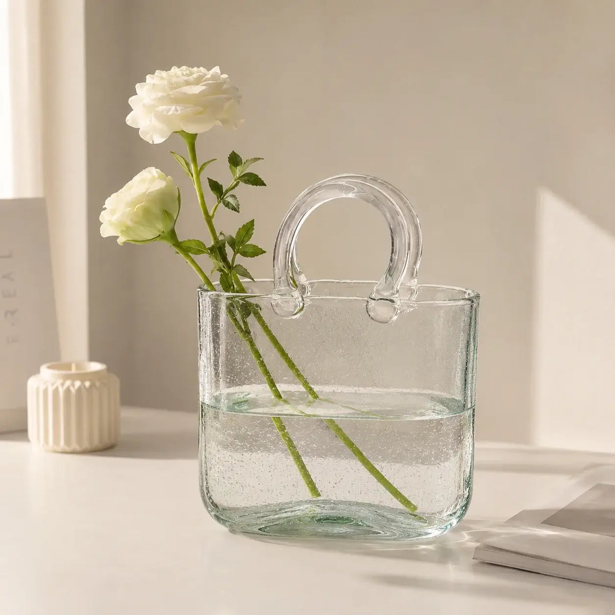 Homero Transparent Hand Blown Glass Vase with Elegant Purse Design